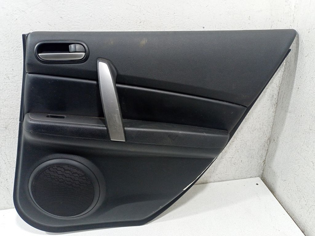 Обшивка (дверная карта) двери задней правой Mazda