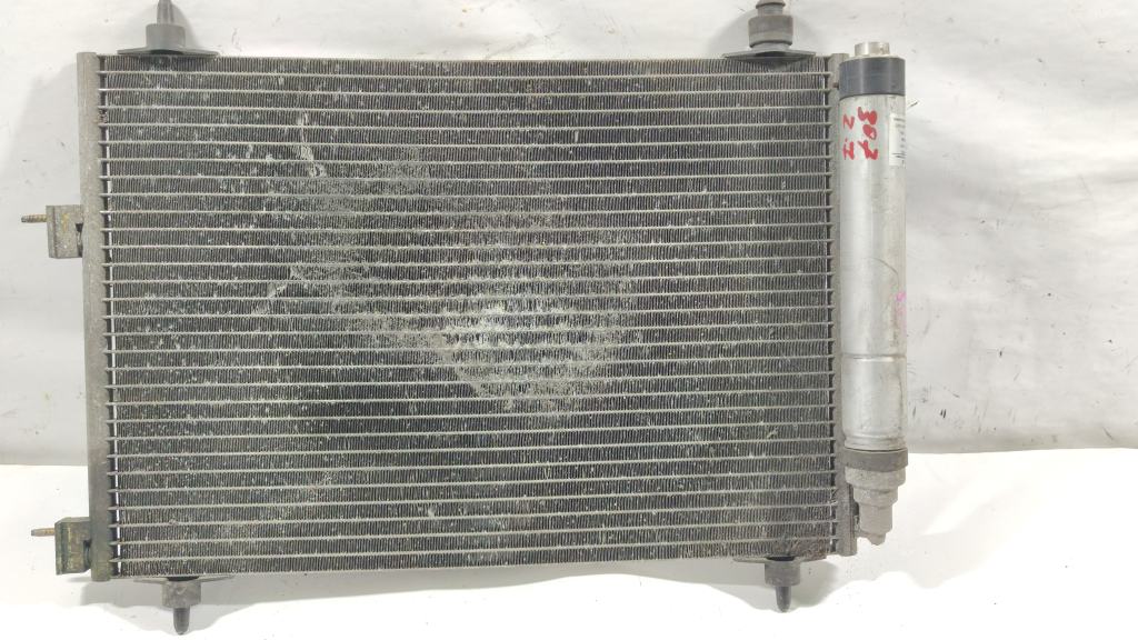 Радиатор кондиционера Peugeot